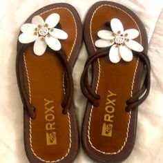 No Tags But New And Unworn. It’s A Size 6 But Leans A Little Big And Also Fits A 6.5 (Mg Size So I Know For Sure)! White Leather Beach Flip Flops, White Adjustable Sandals For Beach, Adjustable White Sandals For Beach, White Round Toe Flip Flops For Vacation, Adjustable White Flip Flops For Beach Season, Casual White Leather Flip Flops, White Leather Summer Sandals, Adjustable White Leather Flip Flops, Roxy Shoes