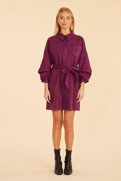 Flattering yet comfortable, our Faux Suede Belted Dress with Ruched Sleeves is the perfect piece to complement a more sophisticated fall wardrobe. This chic dress, crafted from soft faux suede, features three-quarter ruched sleeves, a belted waist for a flattering fit, and drop shoulders for a modern touch. Available in timeless and versatile Black or Deep Purple, a rich and elegant jewel tone. Faux suede Belted Ruched three-quarter sleeves Drop shoulders Available in Deep Purple and Black Dry c Chic Belted Dress For Fall, Fall Ruched Mini Dress For Workwear, Chic Ruched Dresses For Fall, Fall Workwear Dresses With Ruched Details, Fall Ruched Dresses For Work, Ruched Dresses For Fall Workwear, Ruched Dresses For Workwear In Fall, Fur Top, Linen Gauze