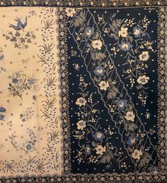 three different rugs with blue and white flowers on the sides, one has a black border