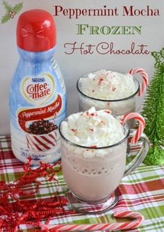 peppermint mocha frozen hot chocolate in two mugs with whipped cream on top