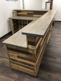 a wooden counter top sitting on top of a hard wood floor