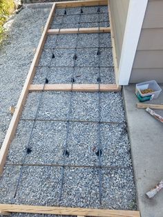 the foundation of a house being built with wood and concrete in place to support it