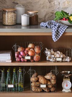 the shelves in this kitchen are filled with vegetables and fruits, along with other food items