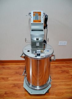 a machine that is sitting on top of a wooden floor