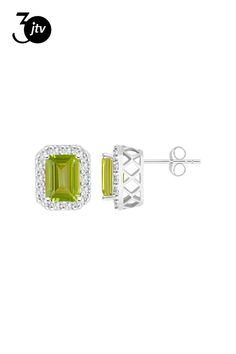 8x6mm emerald cut peridot and round white topaz rhodium over sterling silver halo stud earrings. Measures approximately 0.48" L x 0.40" W and have post with friction backings. Emerald Cut Halo Design Jewelry As Gift, Diamond White Cubic Zirconia Jewelry With Gemstone Accents, Emerald Cut Gemstone Jewelry For May Birthstone, Fine Jewelry With Emerald Cut Gemstone Accents, White Gold Jewelry With Gemstone Accents In Cubic Zirconia, May Birthstone Jewelry With Emerald Cut Gemstone Accents, Emerald Cut Gemstone Accents Fine Jewelry, Emerald Cut Gemstone Fine Jewelry, Classic Cubic Zirconia Jewelry With Gemstone Accents