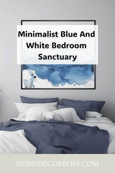 Minimalist bedroom with blue and white bedding and abstract blue wall art.