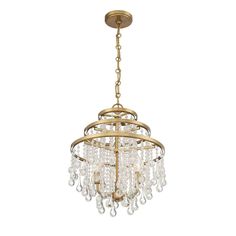 a gold chandelier with crystal drops hanging from it's centerpieces