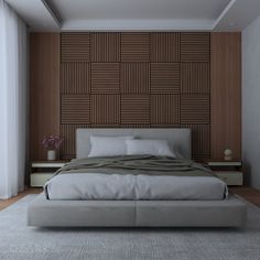 a large bed sitting in the middle of a bedroom next to a wall with wooden paneling