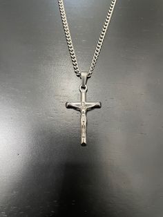 Silver Crucifix Pendant Chain Necklace FREE & Fast Shipping! *Premium Stainless Steel *Pendant Length is 3 Centimeters *Comes with 20 Inch Length 2mm Cuban Link Chain *Will not tarnish, fade, or discolor *Safe in Water *Pendant is removable *Also available in Gold Shipping Time -Allow 1-2 Days for Processing -Domestic Delivery in 2-6 Days -International $10-$12 / Delivery 5-14 Days Depending on Location Silver Cross Chain Necklace With Curb Chain, Silver Cross Curb Chain Necklace, Silver Cross Necklace With Curb Chain For Gift, Necklaces Gift, Women Chain, Chain Necklaces, Cuban Link Chain, Unisex Jewelry, Stainless Steel Pendant