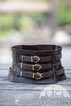 This embossed leather belt is a more feminine rendition of Viking war belts. Maiden Energy, Fair Clothes, Rae Aesthetic, Viking Knotwork, Viking Aesthetic, Harry Clarke, Viking Belt, Dnd Inspiration, Medieval Belt