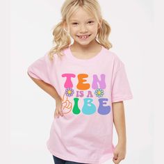 Ten is a Vibe Groovy Retro Birthday shirt, unique cute shirt to remember your little one's  Birthday!! Please read all the info before placing your order. The price you see is per shirt, please read the size chart in the last pictures of listings before placing your order. How to order a shirt: *Select the STYLE *Select the SIZE *Select the Quantity *Add Personalization *Add to cart *Go back and Repeat for each size (if you need more than one shirt) SHIRTS INFO: *Color:Pink, White, Natural 100% Trendy Pink Tops For Birthday, Pink Number Print T-shirt For Birthday, Pink T-shirt With Name Print For Summer, Pink T-shirt For Birthday In Summer, Pink Short Sleeve T-shirt With Number Print, Pink Summer T-shirt For Birthday, Summer Pink T-shirt With Name Print, Trendy Pink T-shirt For Birthday, Trendy Pink T-shirt With Name Print