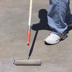 a person with a mop on the ground