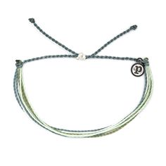 Be a green queen in this Earth Day mixed Original bracelet. This super-stackable style features strings in soft blue, green and white shades and packs an eco-chic punch. For each bracelet sold, Pura Vida will donate 5% of the purchase price to the National Parks Conservation Association, helping to fund its mission to protect and preserve Americas national parks for present and future generations. | Pura Vida Original string bracelet in Earth Day design. | Wax-coated polyester string cord with m Adjustable Green Bracelets For Everyday, Everyday Adjustable Green Bracelets, Everyday Green Bracelets With Adjustable Cord, Adjustable Multi-strand Bracelets For Summer, Green Friendship Bracelets With Sliding Knot For Everyday, Everyday Green Friendship Bracelets With Sliding Knot, Adjustable Light Green Bracelets For Gift, Adjustable Light Green Bracelets As Gifts, Green Adjustable Cord Friendship Bracelet