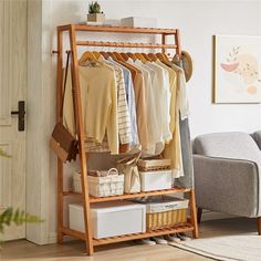 a wooden rack with clothes hanging on it