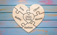 a wooden heart shaped puzzle with words on it