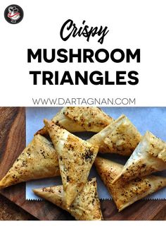 crispy mushroom triangles on a cutting board with text overlay that reads crispy mushroom triangles