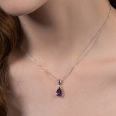 "Features: * Sterling silver Amethyst pendant necklace for women. Elegant silver pendant necklace for women with a sparkling teardrop Amethyst gemstone. * 10mm by 7mm pear-shaped Amethyst stone set on a stylish 925 silver pendant frame; with an adjustable 18\" chain, including 2-inch extension links. Pendant size 7mm by 20mm. * Solid silver chain and pendant for women. These ladies necklaces are made from Rhodium plated 925 Sterling Silver. * High-quality 925 sterling silver necklaces for women. Women Pendant Necklace, Amythest Necklace Pendants, Necklaces Amethyst, Silver Necklaces Simple Unique, Purple Silver Necklace, Amethyst Pendant Necklace, Necklace Amethyst, Silver Amethyst Necklace, Small Necklace Designs