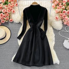 Black two pieces dress black knitted sweater + woolen sleeveless dressFabric: blendedColor: blackSize(cm): M, LSweaterlength 53 bust 70-94 sleeve length 56Dress&ltp&gtM length 97 bust 84 waist 78&lt/p&gt&ltbr/&gt&ltp&gtL length 98 bust 88 waist 82&lt/p&gt&ltbr/&gt Black V-neck Sweater Dress For Evening, Black Winter Midi Dress, Black Solid Midi Dress For Winter, Black Solid Color Winter Midi Dress, Fall Turtleneck Party Dress, Fall Party Turtleneck Dresses, Solid Color Midi Sweater Dress For Winter, Black Solid Color Winter Dress, Elegant Solid Color Sweater Dress For Winter