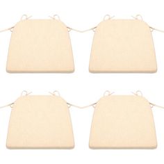 four pieces of beige fabric with ties on each side and one piece in the middle