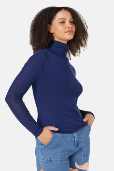 Elevate your closet essentials with our Rib Merino Polo Top. Crafted from non-mulesed merino wool jersey, it offers both comfort and an eco-friendly option. The rolled polo neckline adds a sophisticated touch, while the naturally insulative fabric ensures warmth. Featuring full-length sleeves and a fitted shaping, it finishes at the hip, making it perfect for layering during cooler weather and tucking into your favourite bottoms. Embrace the timeless style and cosy comfort with this versatile piece, perfect for everyday wear! Product Code: GGFX137 Polo Top, Closet Essentials, Cooler Weather, Australian Fashion, Timeless Style, Textile Design, Merino Wool, Knit Top, Timeless Fashion