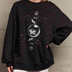 Celestial Coziness: Simply Love Earth & Moon Sweatshirt – A Celestial Must-Have! Snuggle up in style with our Earth & Moon Bliss Sweatshirt! This celestial must-have combines heavenly comfort with cosmic charm, making it your go-to cozy companion. Whether you're stargazing or enjoying earthly delights, this sweatshirt is your ticket to celestial coziness. Features: Round neck Long sleeves Long Tee Product measurements: Slightly Stretchy S: front length 26.5 in, shoulder 19.9 in, bust 44.5 in, sl Moon Sweatshirt, Love Earth, Earthly Delights, Moon Graphic, Our Earth, Long Tee, Charm Making, Sweat Shirt, Graphic Sweatshirt