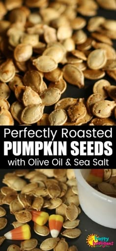 pumpkin seeds with oil and sea salt in a bowl on a black surface next to a pile of shelled pumpkins