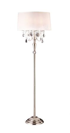 a table lamp with a white shade on it and crystal beads hanging from the base