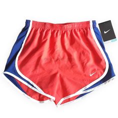 Nike Red Sporty Athletic Shorts, Nike Sporty Red Athletic Shorts, Nike Red Sporty Shorts, Nike Red Athletic Shorts, Red Stretch Nike Athletic Shorts, Nike Sports Shorts In Red, Nike Red Stretch Athletic Shorts, Red Stretch Athletic Shorts For Spring, Sporty Red Athletic Shorts For Spring