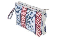 a white and blue bag with red designs on the front, sitting against a white background