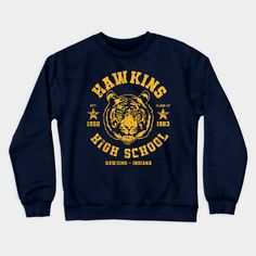 Hawkins High School ✅ - If you are fan of Eleven and Friends, you will enjoy this retro design with the team sports. You can wear on T-shirts, Hoodies, Tanks and more cool stuff right now!!! -- Choose from our vast selection of crewneck sweatshirts to match with your favorite design to make the perfect custom graphic crewneck sweatshirt. Pick your favorite: Crewneck Sweatshirt or Lightweight Crewneck Sweatshirt. Customize your color! For men and women. Winter College T-shirt With Logo Print, University Logo Cotton Sweatshirt For Fans, College Crew Neck Sweatshirt With Team Logo, University Logo Cotton Sweatshirt For Fan Gear, University Logo Cotton Sweatshirt Fan Gear, Team Spirit Sweatshirt With Logo Print For Fans, School Spirit Sweatshirt With Team Logo For Sports Season, Fan Gear Sweatshirt With Logo Print, Sporty Winter T-shirt For College