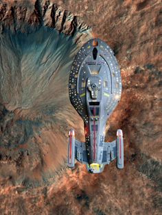 an aerial view of a space station in the desert