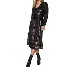 This sequin wrap dress features a mix of gold and black sequins with long sleeves, and finished with a sash tie at the waist and a slip.Snap button closure at center front; Snap buttons at slip lining100% polyester sequin; Lining: 100% polyester tulle (under self); 100% polyester crepe de chine (slip lining)Hand wash Sequin Wrap Dress, Scalloped Lace Dress, Runway Dresses, Luxury Women Fashion, Lace Bodice, Scalloped Lace, Black Sequins, Dresses Xs, Snap Button