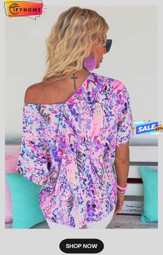 Pink Loose Painted Floral Tee Purple Short Sleeve Top For Vacation, Purple Printed Blouse For Summer, Beach Blouse With Graphic Print, Printed Purple Blouse For Vacation, Summer Purple Printed Tops, Summer Printed Purple Tops, Purple Printed Blouse For Vacation, Summer Short Sleeve Tops With Vibrant Print, Purple Short Sleeve Blouse For Beach