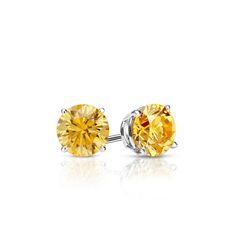 4-Prong Basket-set yellow round diamond stud earrings make a stylish statement in beauty. These 14k white gold stud earrings sparkle with a total weight of 0.33 ct. and are available with push- back, screw back or lever back clasps. Round Diamond Stud Earrings, Yellow Diamond Earring, Yellow Canary, Black Diamond Pendant, Black Diamond Studs, Halo Diamond Earrings, Solitaire Diamond Pendant, Diamond Earrings Studs Round, Colored Diamond Rings