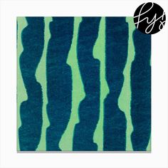 a blue and green rug with stripes on it