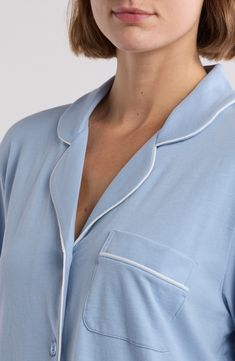 Vibrant piping outlines this classic nightshirt styled to flatter the figure with a curved collar and shirttail hem. Notched collar Long sleeves 100% cotton Machine wash, dry flat Made in Peru Blue Collared Cotton Sleepwear, Casual Cotton Tops For Night, Classic Blue Sleepwear For Bedtime, Classic Blue Tops For Loungewear, Classic Long Sleeve Sleepwear For Spring, Night Shirt, Notched Collar, Anniversary Sale, Pink Stripes