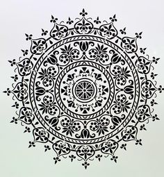 an intricate black and white circular design