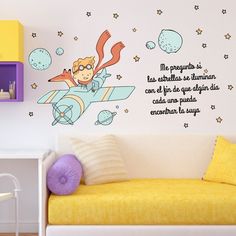 a child's bedroom with a wall decal featuring a cartoon girl on a plane