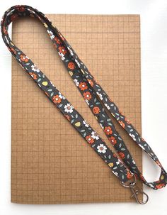 Littlehmakes lanyards have been created using cotton fabric with a metal swivel clasp and are available with or without a breakaway safety clip. Perfect for anyone who works in education, the healthcare profession, at an office or in retail. Ideal for students, festivals goers and dog walkers too! Measurements: Length: approximately 21 inches long Width: half an inch wide Very happy to alter length and width (at no additional cost) - just pop a note of your requirements in the message box at che Pumpkin Fabric, Floral Pumpkin, Fabric Pumpkins, Message Box, Dog Walker, Badge Holders Lanyard, Uk Shop, Lanyard, Halloween Shopping