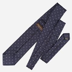 I named this tie after the beautiful city of Pisa, known for its rich history and timeless elegance. Just like Pisa’s enduring architecture, this woven jacquard tie in navy blue with white polka dots brings a classic touch to your wardrobe. The polka dots are woven, not printed, ensuring they stay perfectly symmetrical—a mark of true quality. Whether you're attending a special occasion or just want to carry a bit of Pisa’s charm with you, this tie is the perfect choice. Details Standard Length: Elegant Polka Dot Ties, Classic Polka Dot Ties For Business, Elegant Polka Dot Tie For Black Tie Events, Polka Dot Standard Tie For Business, Luxury Neckwear For Office, Polka Dot Standard Tie For Formal Occasions, Formal Polka Dot Standard Tie, Square Scarf Tying, Dinner Jackets