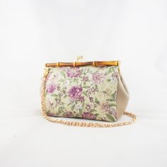 Natural bamboo make from mountains of Japan, paired with pretty floral prints and cream leather, pink chain strap gives a little elegance. Zip pocket*1, pocket*1 Size: 20cm x 17cm x 9cm Strap Length 110cm Elegant Floral Print Shoulder Bag For Spring, Spring Beige Clutch For Formal Occasions, Floral Print Formal Bags For Spring, Formal Floral Print Bags For Spring, Formal Floral Print Bag For Spring, Spring Formal Beige Clutch, Formal Spring Floral Print Bags, Elegant Summer Bags With Floral Print, Spring Clutch With Chain Strap For Everyday Use