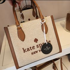 Nwt Kate Spade Kf509 Ellie Small Canvas Tote Crossbody Warm Gingerbread Measurements 8.2" H X 4.48" D 9.36"W (Bottom), 8.88"W (Top) Handle Drop: 5.0" Features Strap Drop: 22" Metal Pinmount Logo Closure Type: Magnetic Snap Closure Dust Bag Included: No Interior: Back Zip Pocket Materials Canvas Trim: Smooth Leather Lining: Two Way Script Logo Lining Imported Style Number Kf509 Logo Line, Script Logo, Small Canvas, Kate Spade Bag, Kate Spade Bags, Smooth Leather, Canvas Tote, Snap Closure, Top Handle