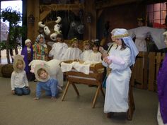 a group of children dressed up in nativity costumes