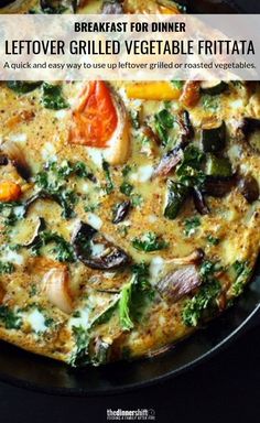 a pizza sitting on top of a pan covered in veggies