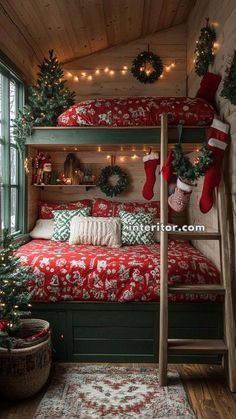 a bedroom decorated for christmas with stockings and stocking on the bunk bed, wreaths hanging from the ceiling