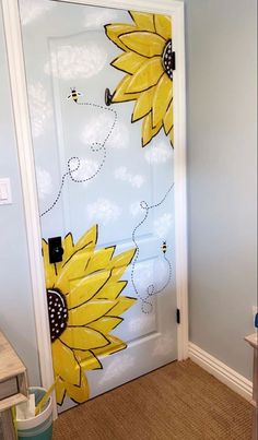 a door with sunflowers painted on it