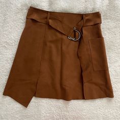 J.O.A. Faux Suede Skirt From Nordstrom. Nwot. Size Small In Camel. Will Fit Size 4-6. Forms With Loop Belt. Asymmetrical Hemline. Brown Suede. Fall Season Belted Mini Skirt, Belted Brown Skirt, Winter Skirt With Belt Loops, Mini Skirt With Belt For Fall, Fall Mini Skirt With Belt Loops, Belted High-waist Mini Skirt For Fall, High Waist Belted Mini Skirt For Fall, Casual Fall Skirt With Belt Loops, Fall High Waist Belted Mini Skirt