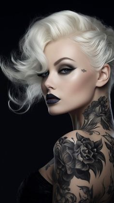 a woman with white hair and tattoos on her neck is looking at the camera while wearing black