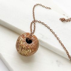 Chain Length : 22" (copper) 18" (black) Donut : 1.25" X 0.75" View All by the Same Maker Black Donut, Donut Shape, Sparkle Necklace, Chain Lengths, Chain Length, Donuts, Washer Necklace, Polymer Clay, Copper