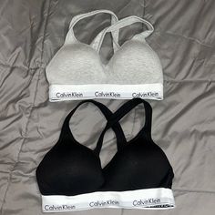 Medium Bra Pair. Black And Gray. New, Never Worn. Have A Slight Push Up. Cross In Back Calvin Klein Sporty Black Top, Sporty Black Calvin Klein Tops, Calvin Klein Fitted Top For Loungewear, Bra And Under Set, Calvin Klein T Shirt, Calvin Klein Bra, Shirt Bra, T Shirt Bra, Calvin Klein Black